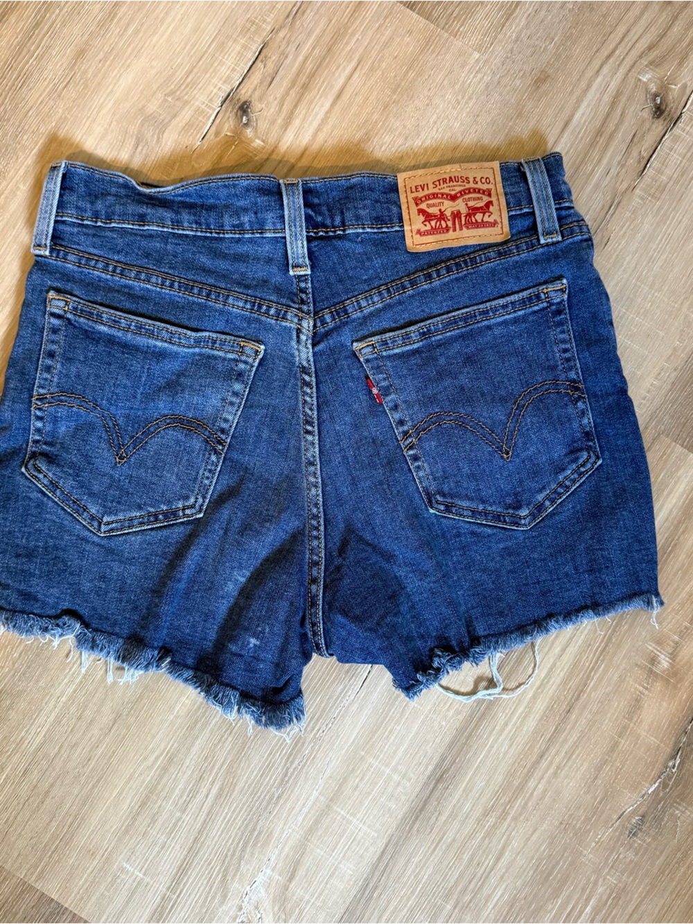Levi’s Dark Blue Stretchy Distressed Denim Cutoff Shorts